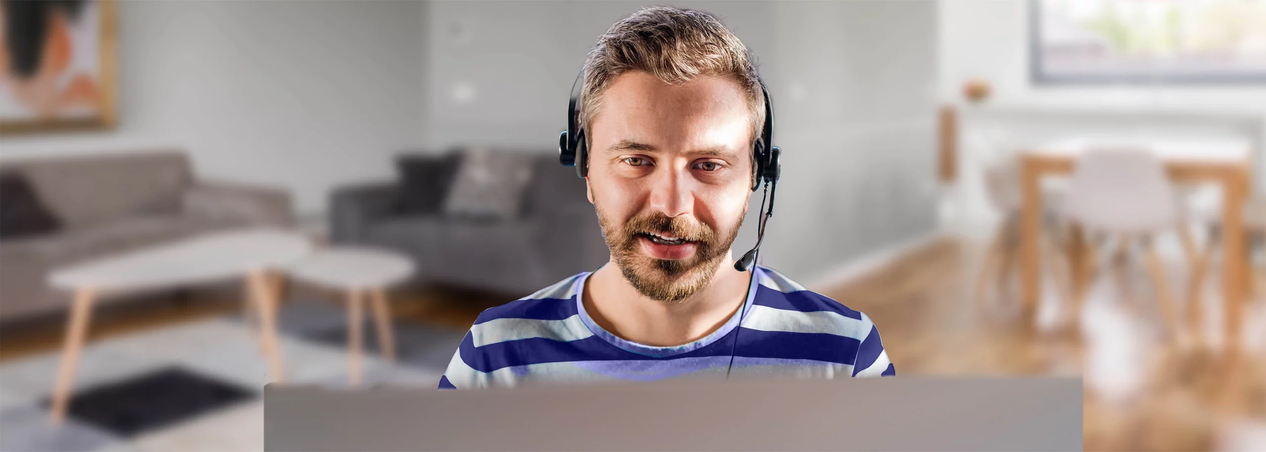 A male agent working from work at home contact center