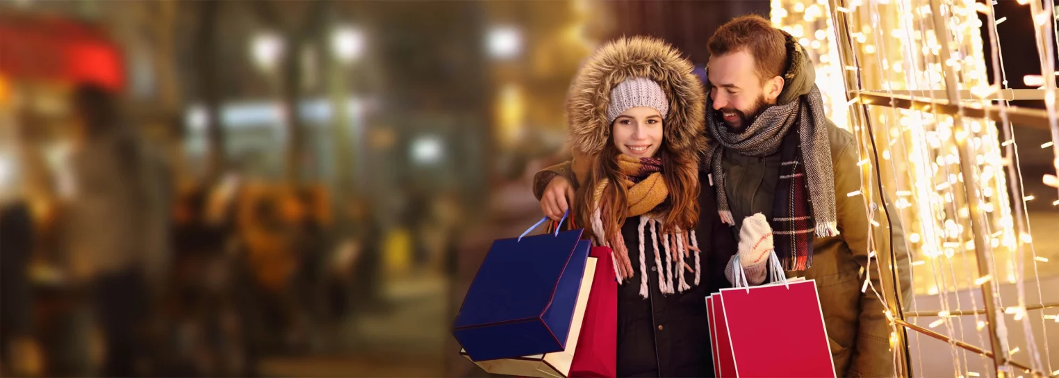 A couple enjoying retail shopping on a holiday