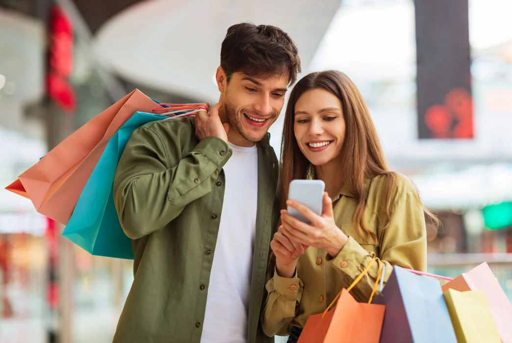 A couple looking at a new product on a e-commerce website