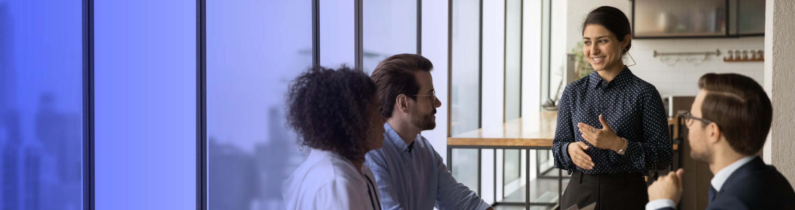Indian business woman leads a business meeting discussion