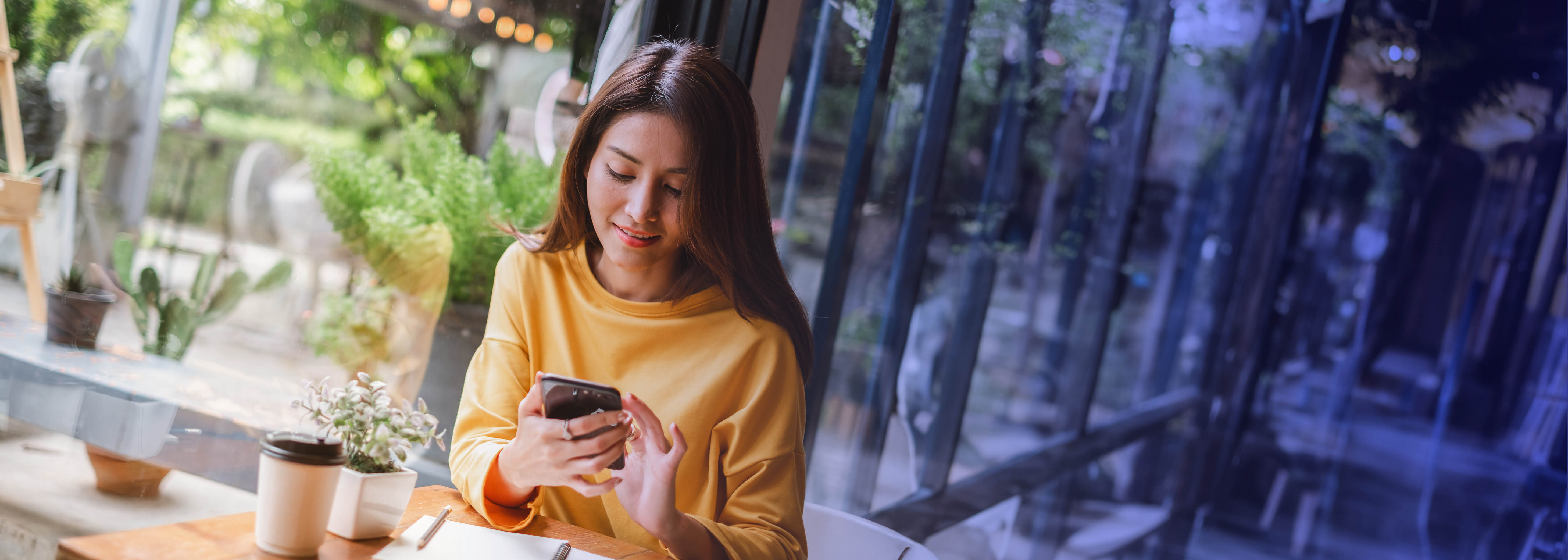 Young woman interacting with a chatbot