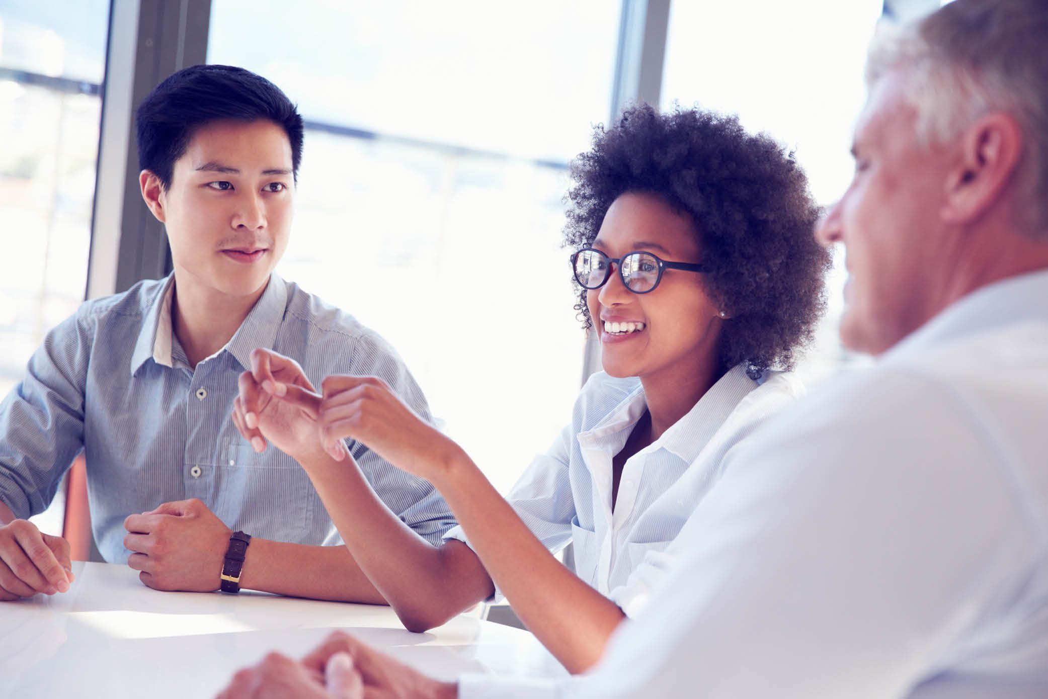 Group of business people discussing strategies