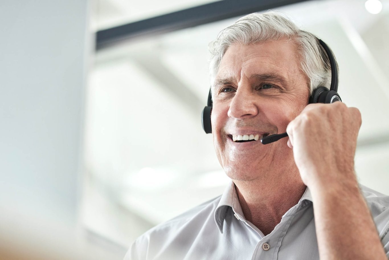 elderly call center agent having an engraining conversation