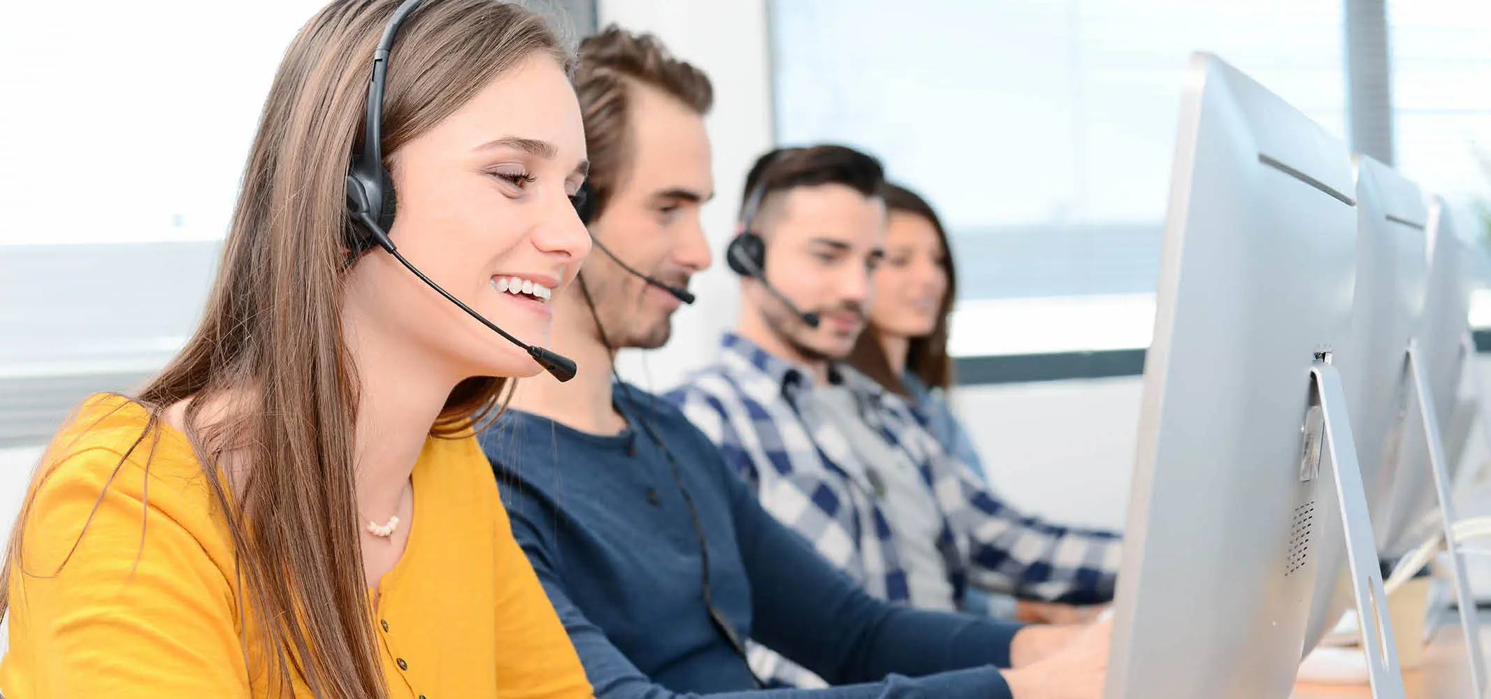 Call center agents learning from AI coach