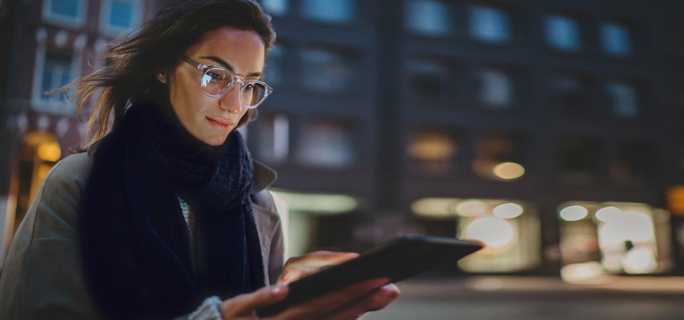Young lady using a chatbot to find her destination