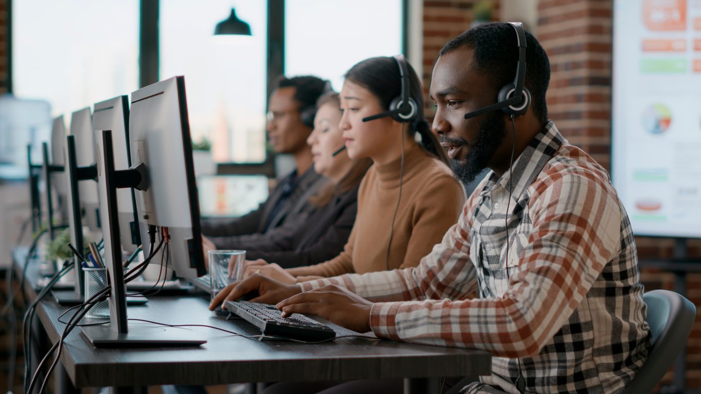 Call center agent tending to a customer