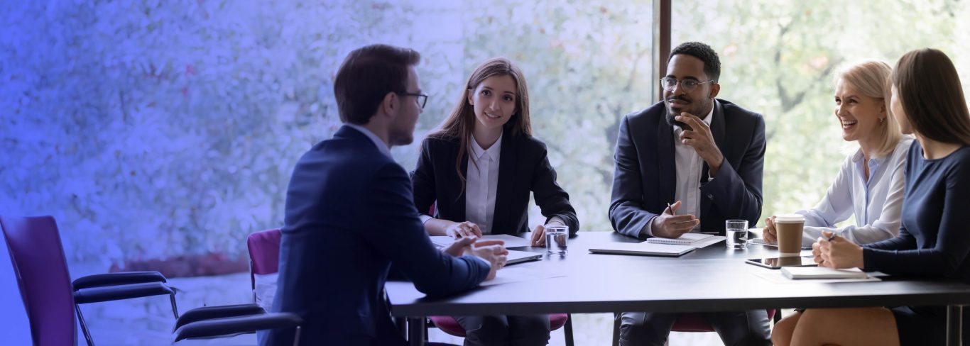 a group of diverse executives in a meeting